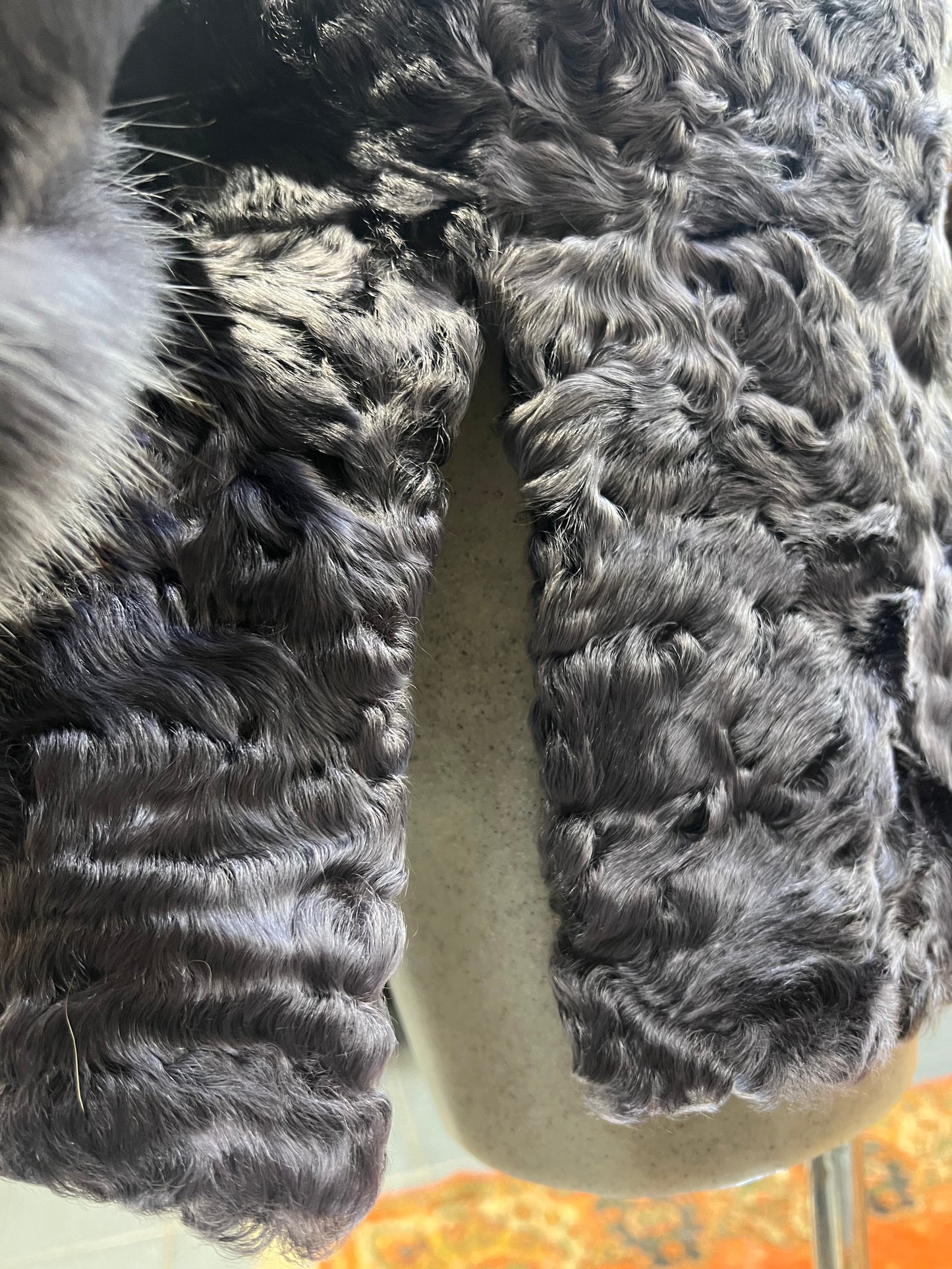 Manteau astrakan col et poignée en renard