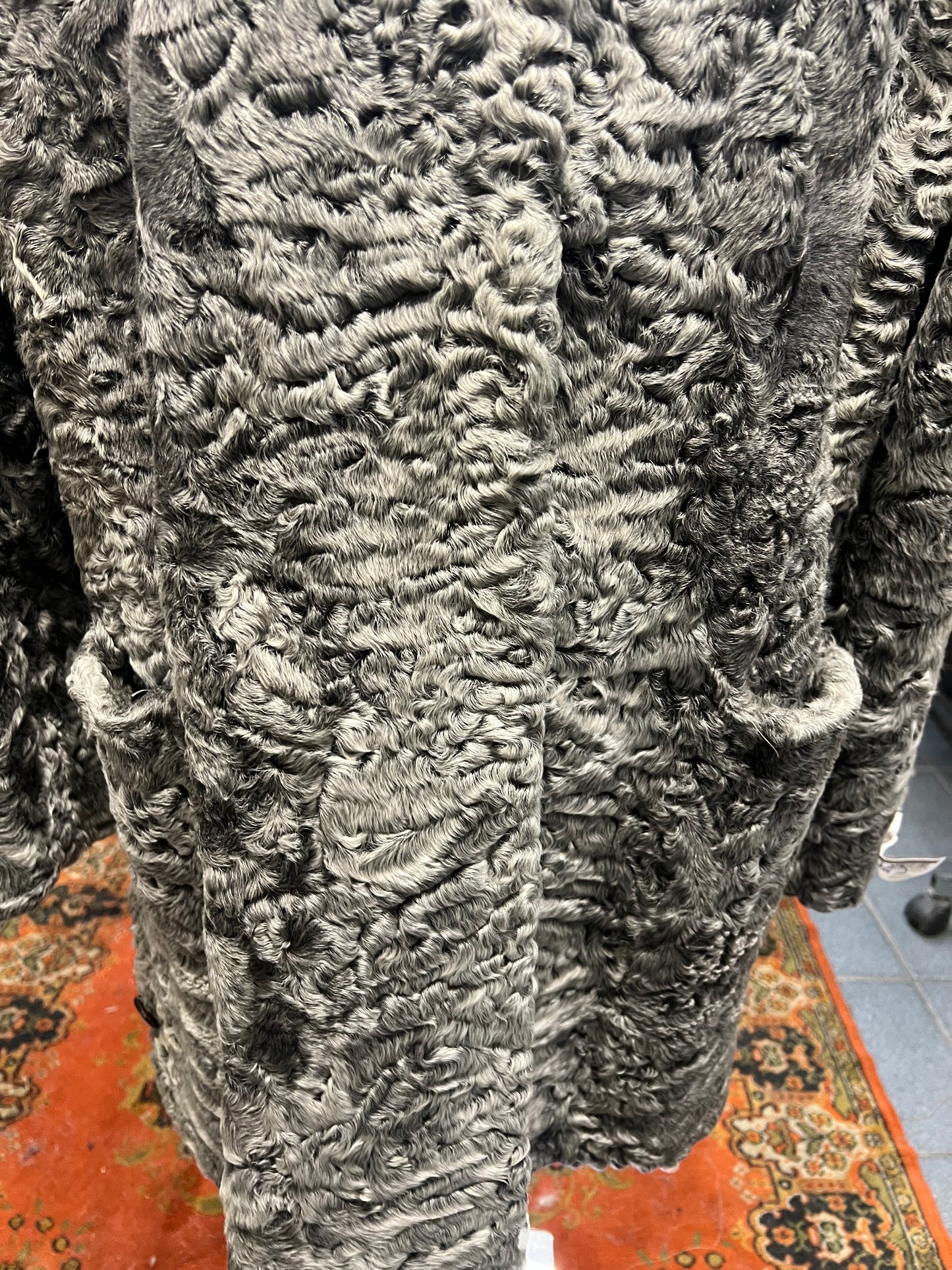 Manteau astrakan avec capuche